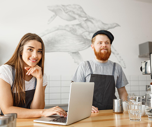 cafe staff on laptop